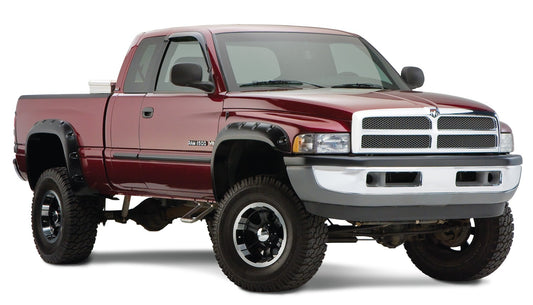 Bushwacker 50908-02 Black Pocket/Rivet Style Smooth Finish 4-Piece Fender Flare Set For 1994-2001 Dodge Ram 1500; 1994-2002 Ram 2500 3500 (Excludes Dually); Fit 78/96 In. Bed